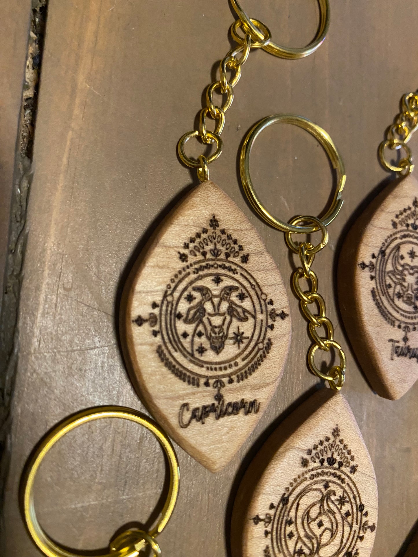 Zodiac sign keychains, solid maple