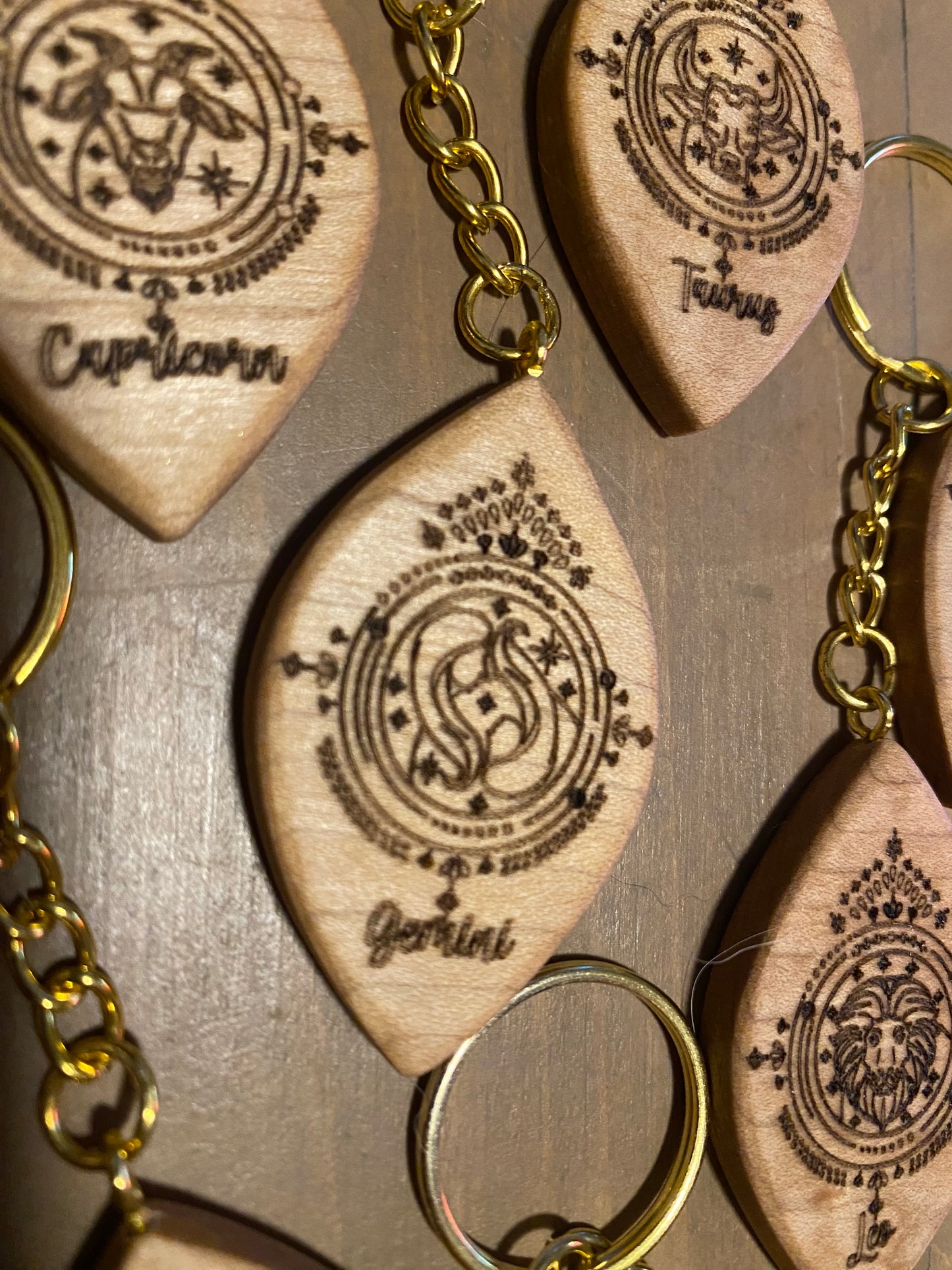 Zodiac sign keychains, solid maple