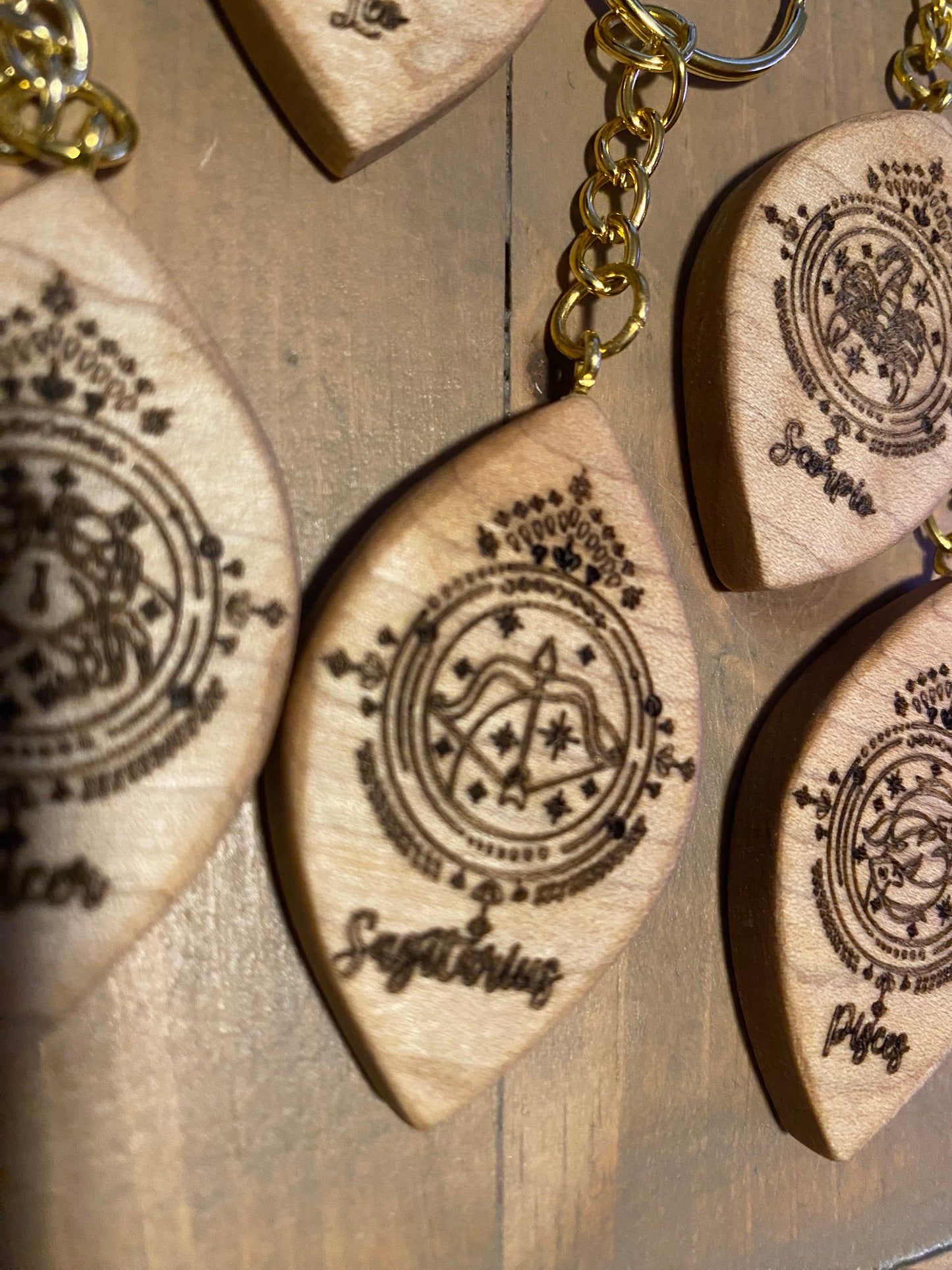 Zodiac sign keychains, solid maple