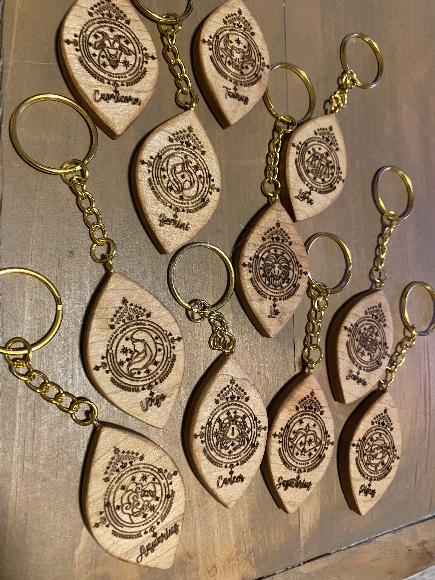 Zodiac sign keychains, solid maple
