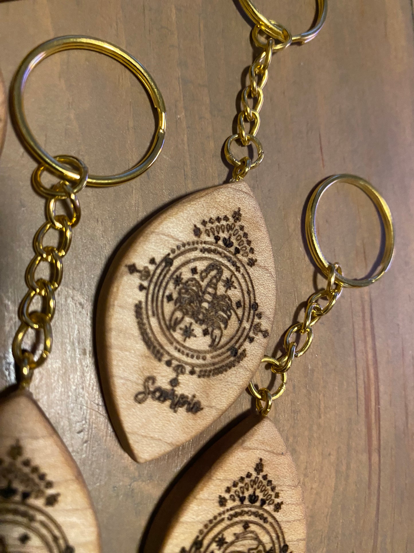 Zodiac sign keychains, solid maple