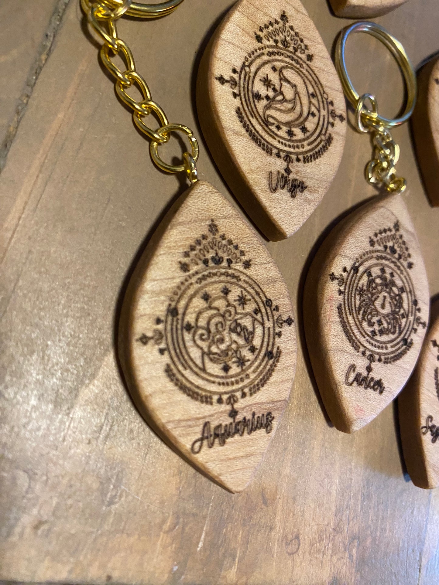 Zodiac sign keychains, solid maple